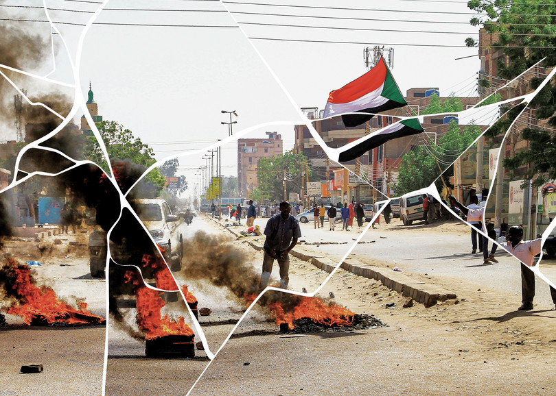 Sudanese pro-democracy activists set tyres alight during demonstrations in Khartoum.