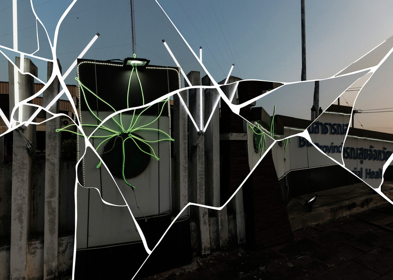 Illuminated cannabis leaf signs outside a provincial health office in Nai Mueang, Thailand.